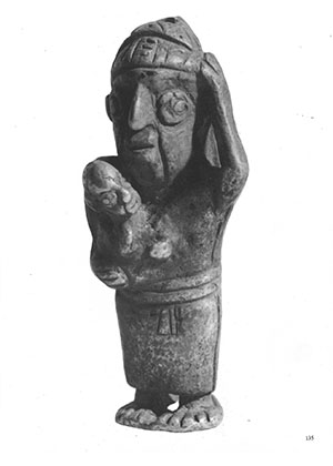 Figurilla Inka vaciada en plata e incisa.